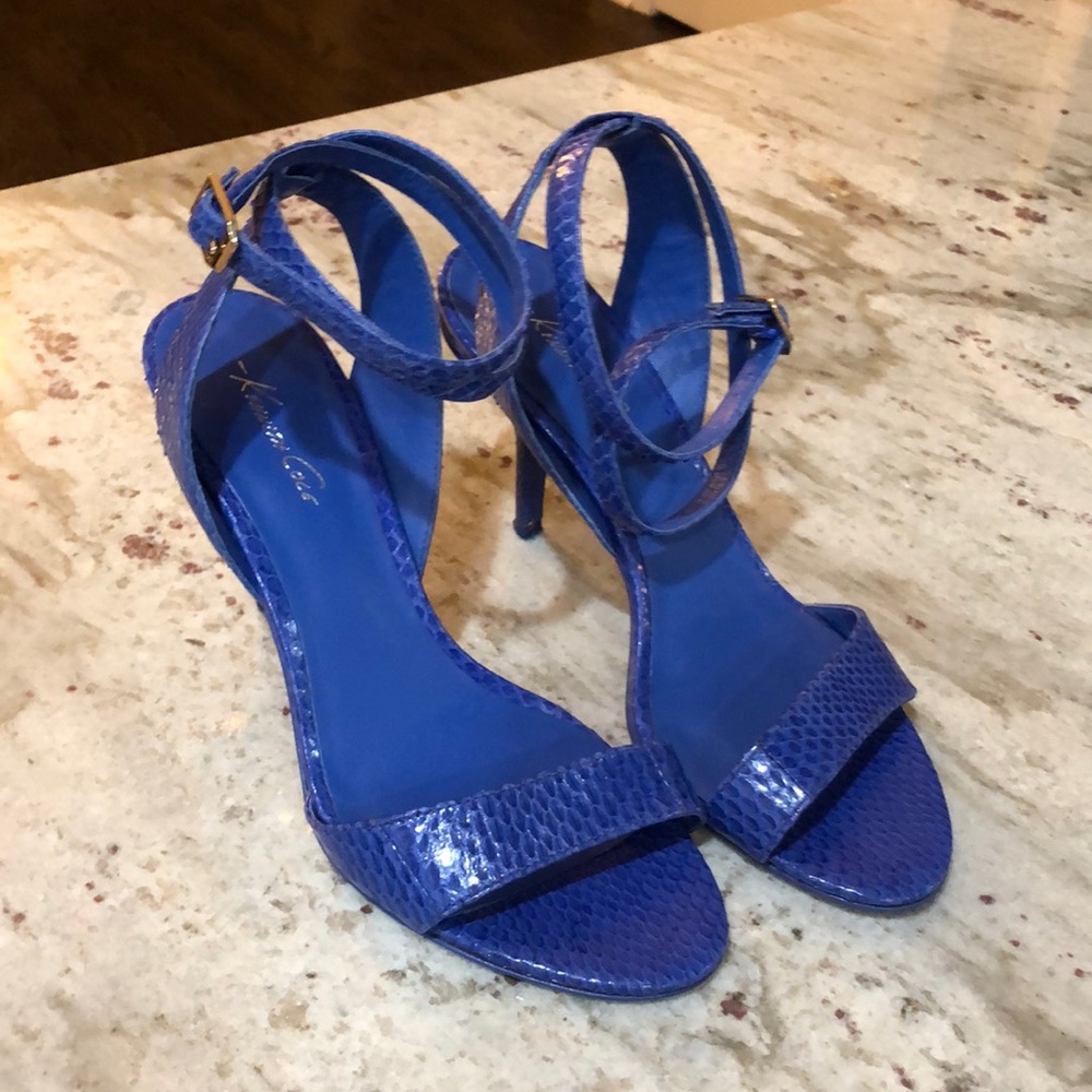 Blue sandals with wrapped ankle strap